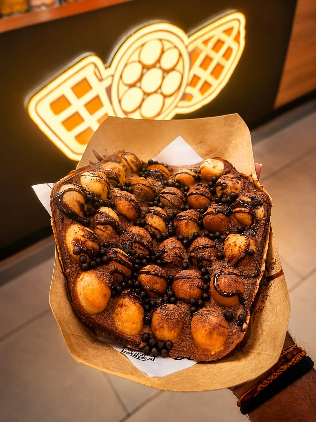 Bubble waffle drizzled with chocolate